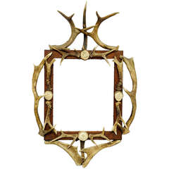 Black Forest Carved Frame with Antler Decoration