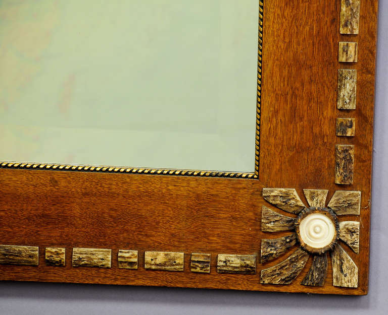 Black Forest antique mirror with antler venered oak wood frame