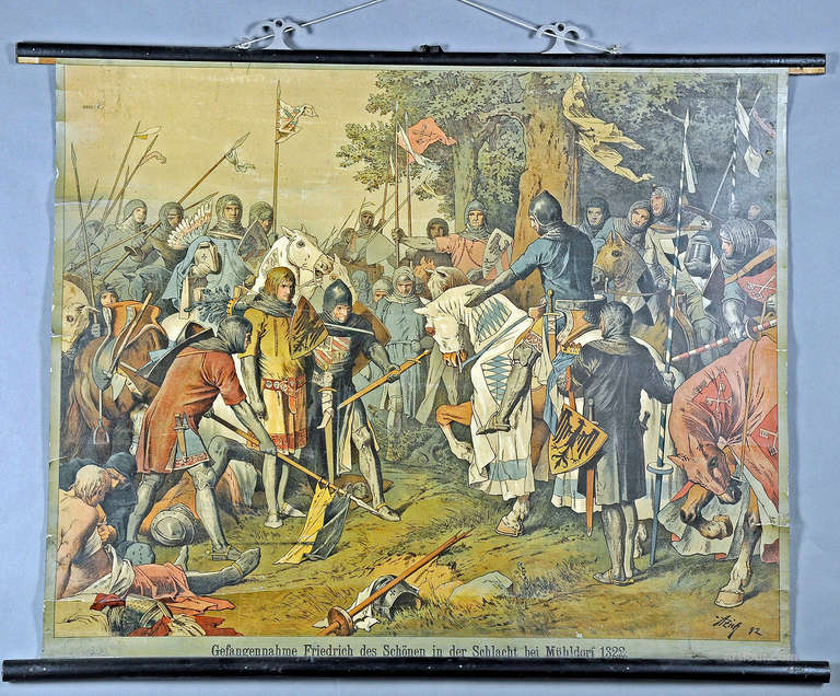An old rollable wall chart showing the capture of Friedrich the beauty in the battle at muehldorf 1322. Used as teaching material in german schools, circa 1930. Colorful print on paper with lamination, reverse side reinforced with canvas.