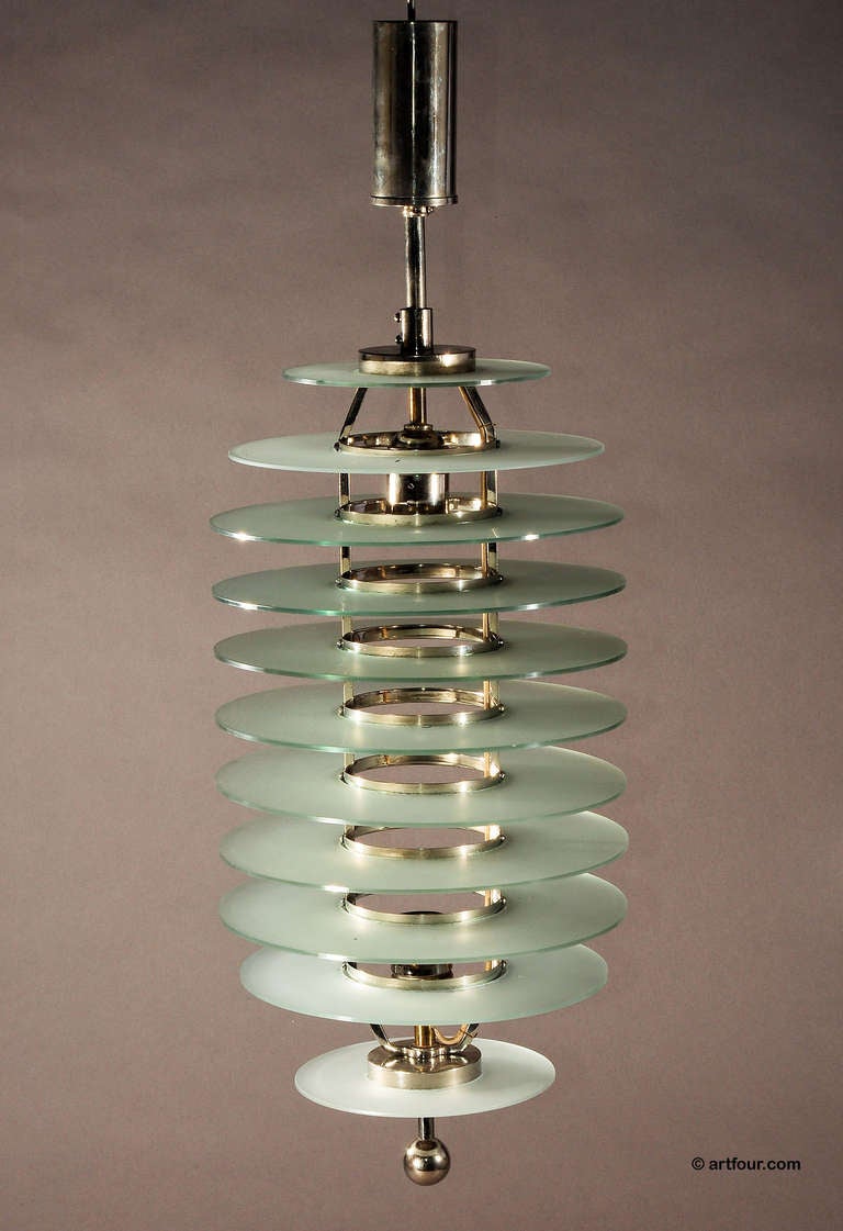 an art deco hanging lamp. nickel plated brass with 11 acid etched glass shades. germany circa 1920.