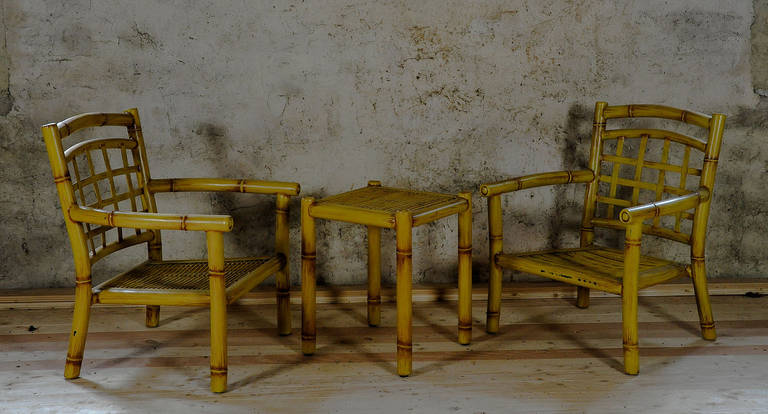 a great 5-part garden furniture set made of painted metal, worked in bamboo design. executed 1970/80. measures taken from bench.