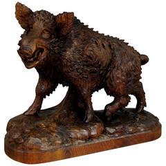 great black forest carved wood wild boar - in the manner of peter burri