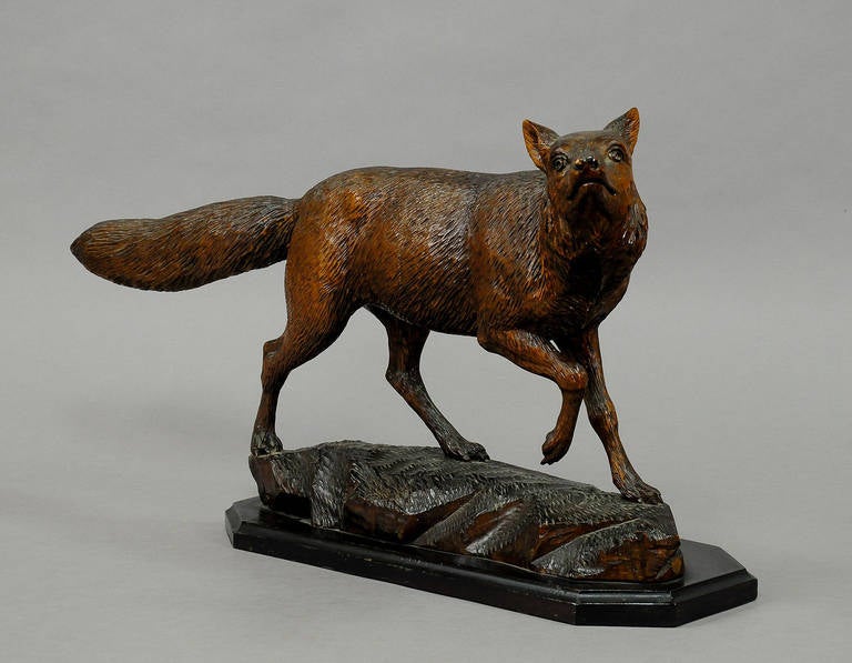 carved wooden fox