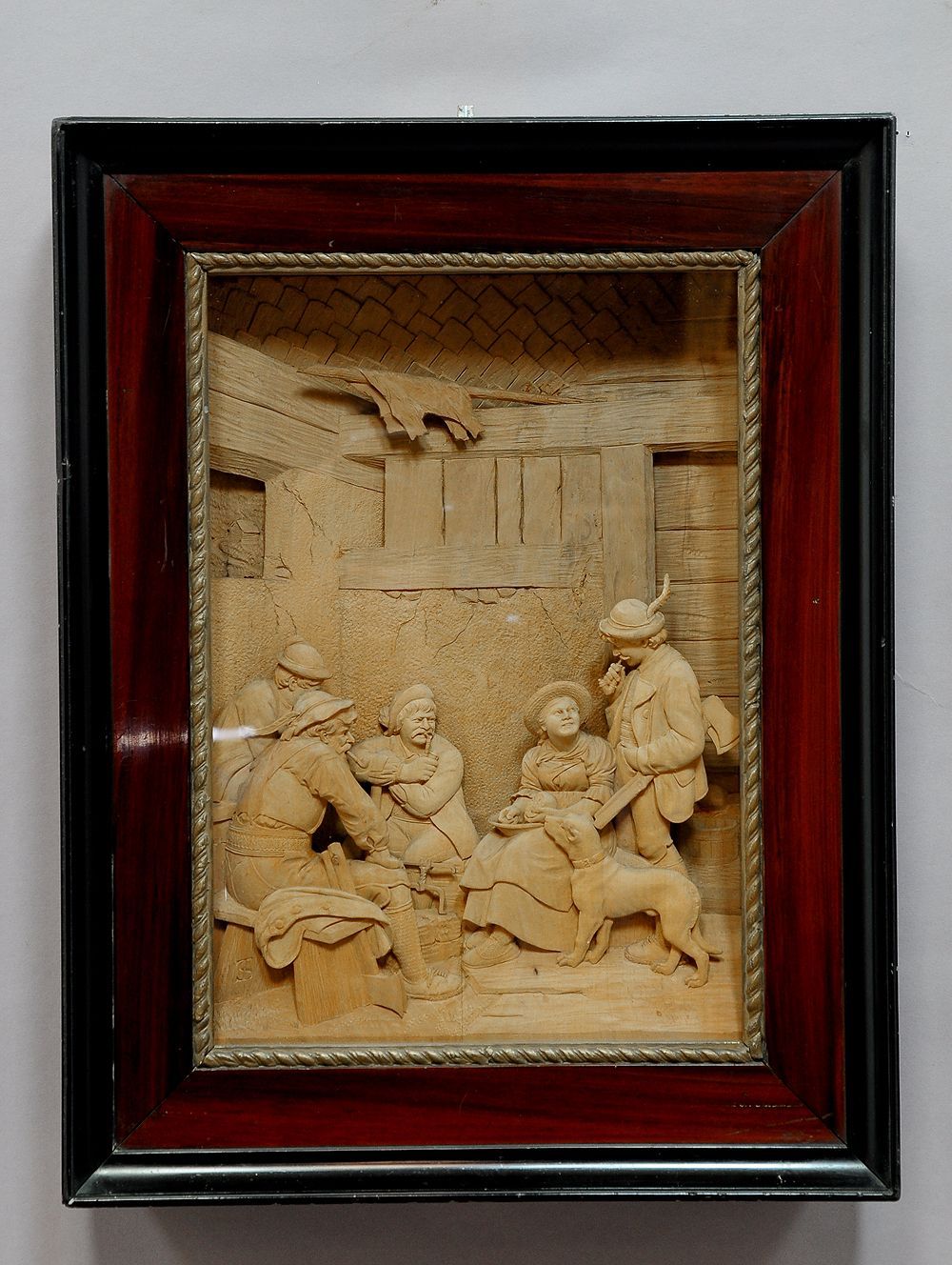 a fine three-dimensional woodcarving of a bavarian folksy scenery. the model for this carving was painted by franz defregger (1835-1921) and is titled 