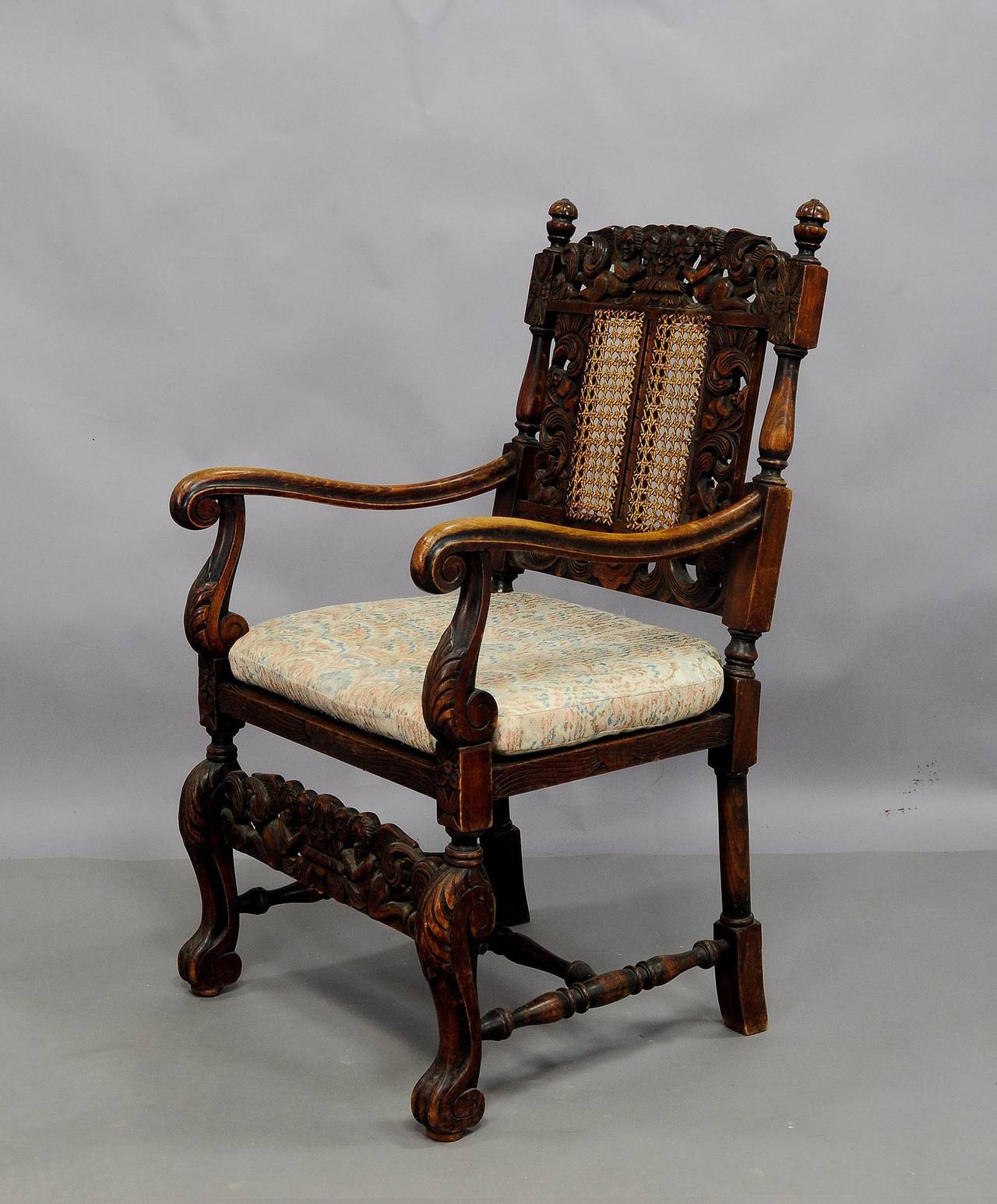Renaissance Pair of Carved Wood Armchairs with Great Cherub Carvings, circa 1900