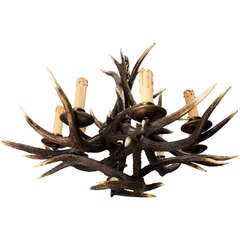 shapely Vintage antler chandelier