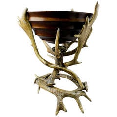 vintage centerpiece with antlers and wooden bowl