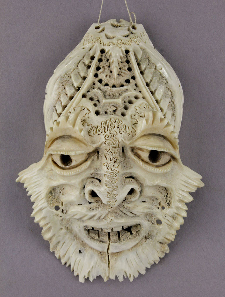 Mid-20th Century a set of three impressive carved deer skulls