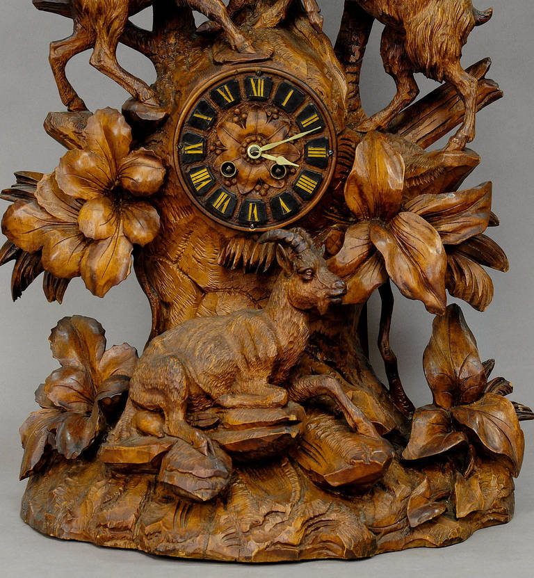 Carved carved wood mountain goats mantle clock swiss brienz