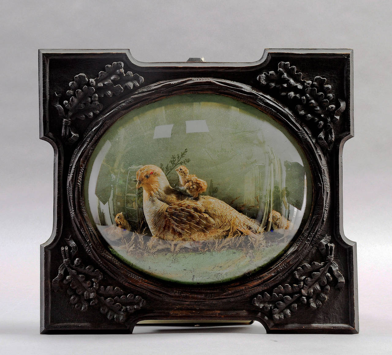 black forest carved diorama with taxidermy partridge