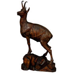 large carved wood chamois by Ernst Heissl