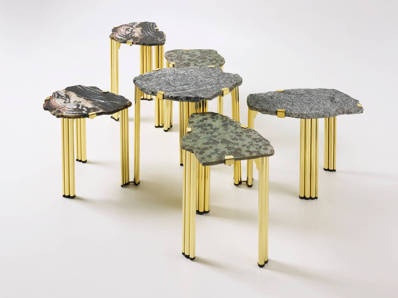 Taher Chemirik’s ‘Pathway Mix’ combines sculpted brass and rare natural hard stones: sardonyx, pinolite, eclogite. Each of the six tables included in this unique set is hand-made and different, and a spectacular evocation of the beauties of Nature.