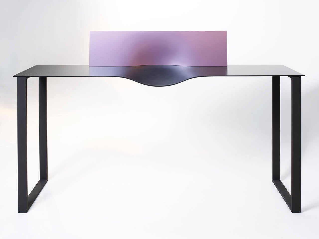 ‘Matrice 09’ is a minimalist, black carbon fiber console, with on top a mauve lacquered fiberglass unit, designed and produced by the creative and technical team of France’s most important engineering practice for contemporary design and in