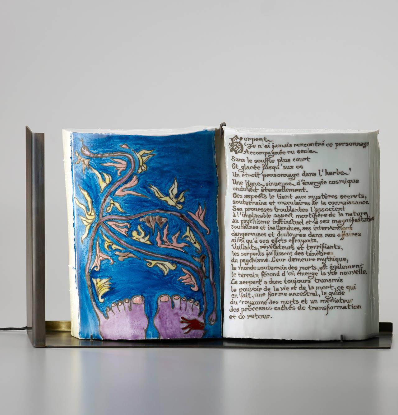 ‘Serpent' is a unique handmade porcelain book and table light sculpture. It is part of the ‘Insomnio’ collection, a set of 21 striking porcelain books handmade by French visual artist Charlotte Cornaton, 28 years old, in the famous historic