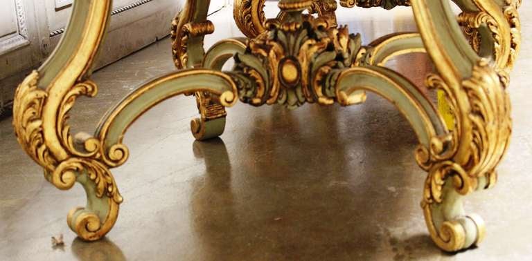 Carved Maison Jansen Regence Style Dining Table with a Green and Gold Leaf Finish