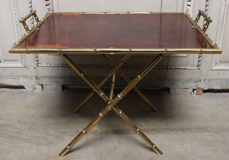 A Faux Bamboo Bronze and Burled Walnut Tray Table. Legs can be adjusted to change height.  It could be used as a coffee table or a side table. Height ranges from 23-26