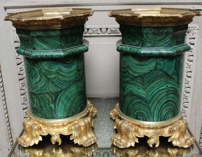 A pair of faux malachite bases with bronze mounts. The bases could make a magnificent pair of lamps.