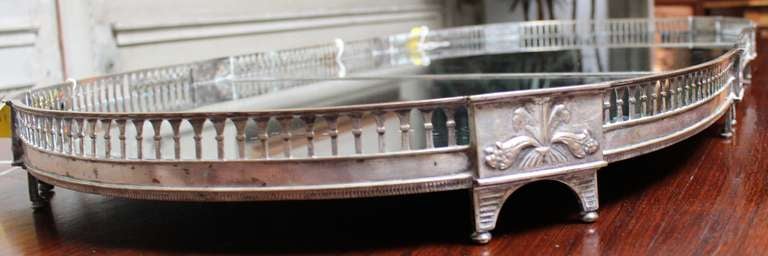 A French Louis XVI Silvered Bronze and Mirrored Three Piece Plateau