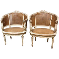 Pair of French Louis XVI Style Caned Bergeres in a Painted Finish 1