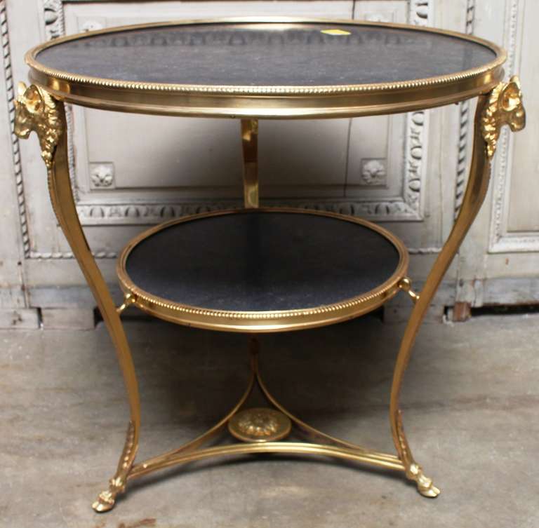 A French Louis XVI Style Dore Bronze Gueridon with A Dark Grey Stone Top