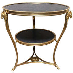 A French Louis XVI Style Dore Bronze Gueridon with A Dark Grey Stone Top