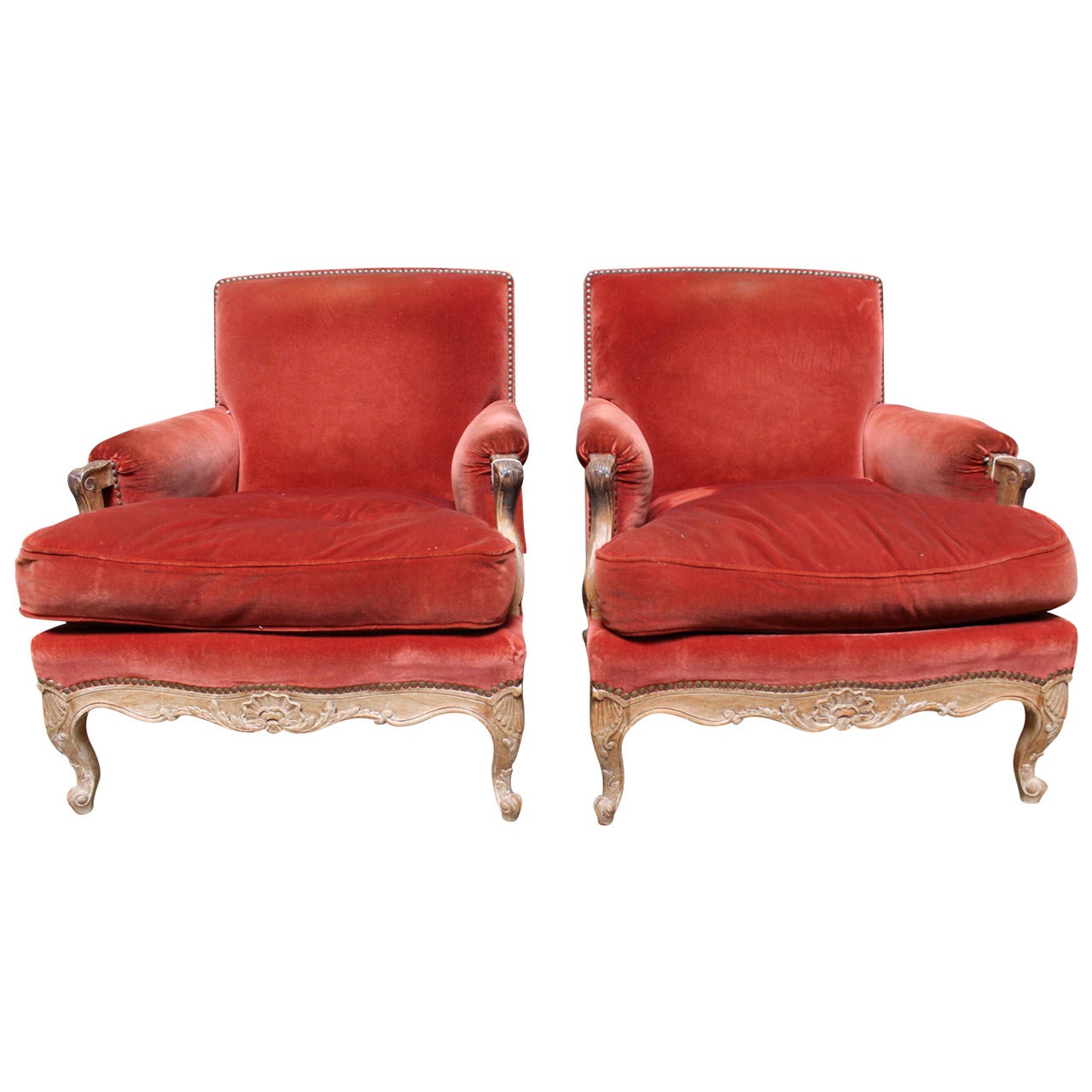 A Pair of French Regence Style Bergeres