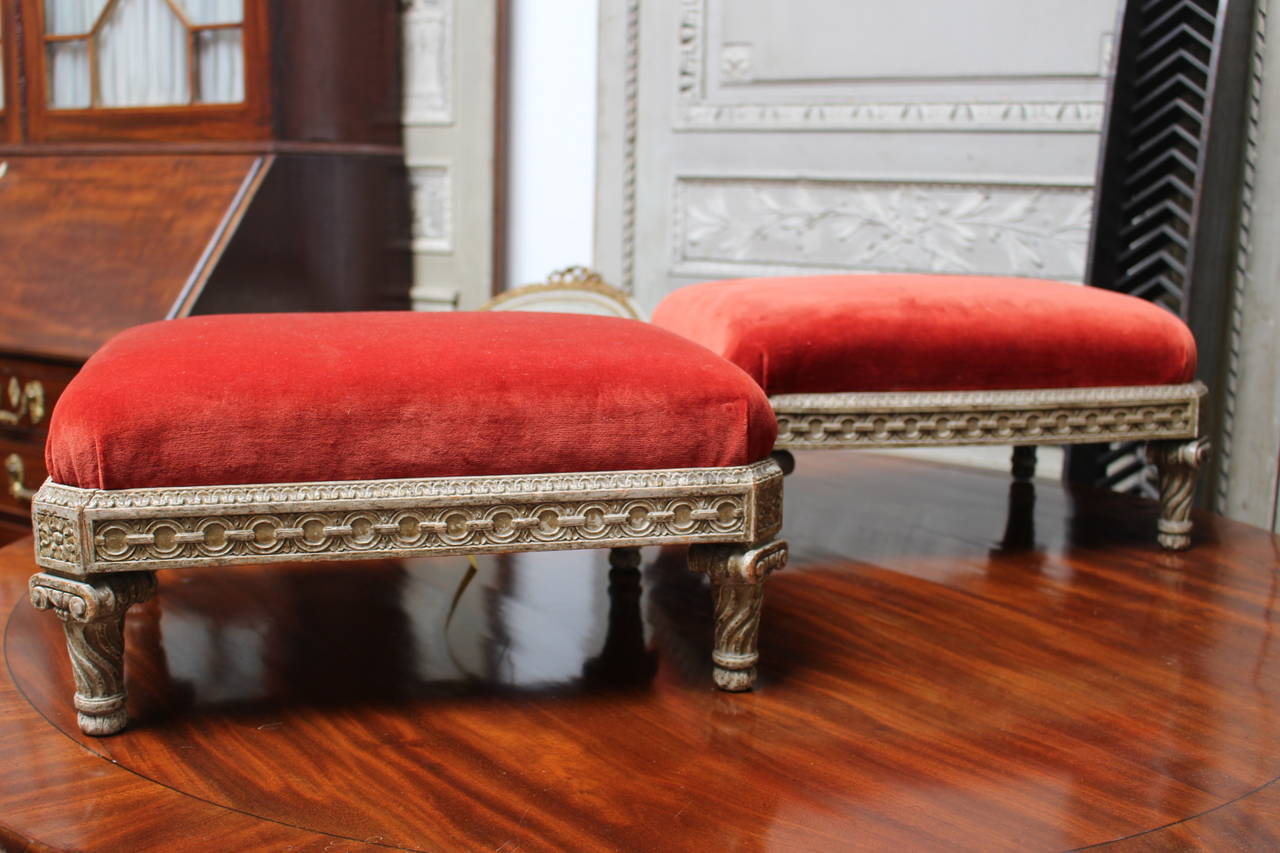A pair of beautifully carved French Louis XVI style carved and painted wood tabourets or footstools