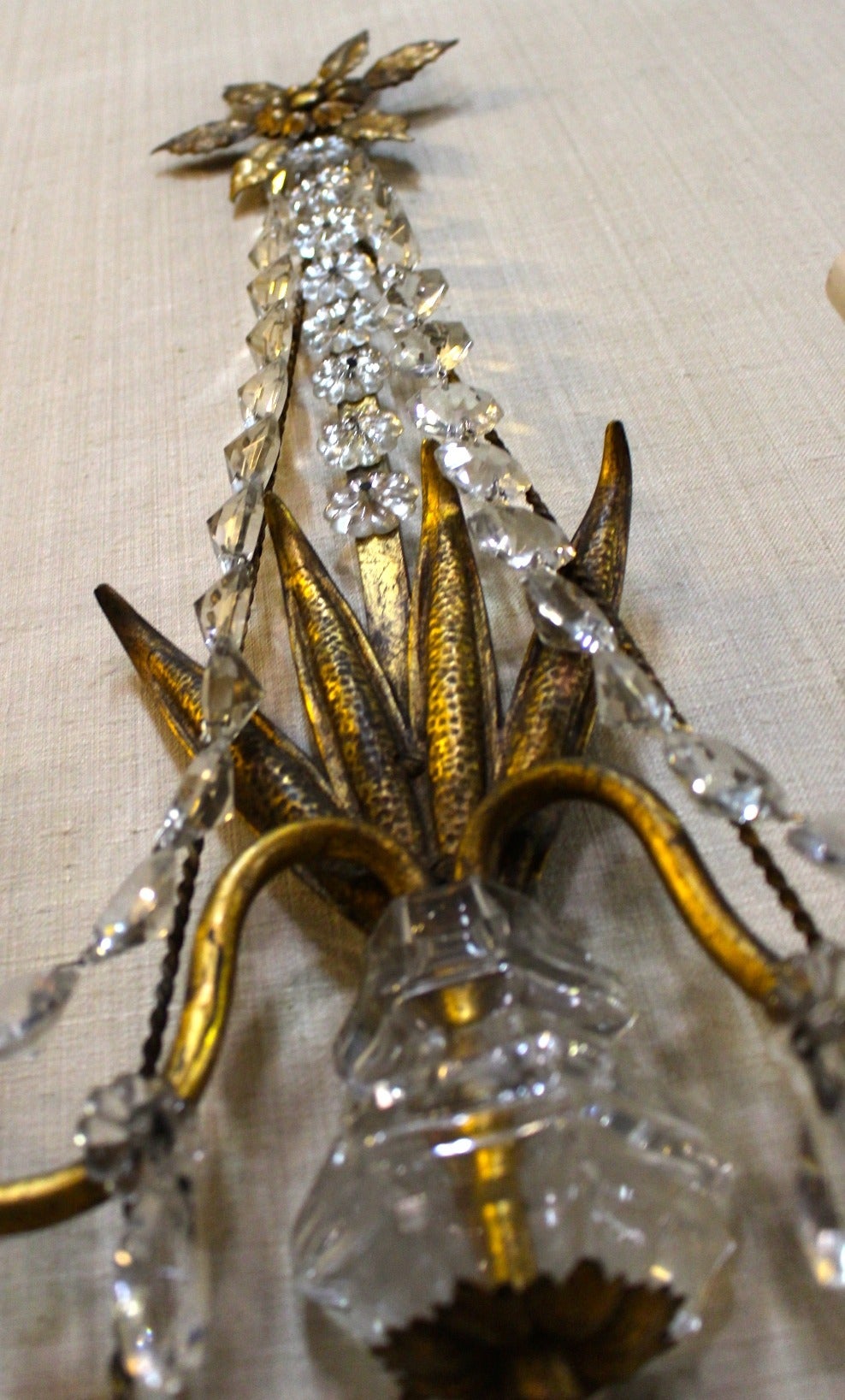 French Pair of Gilded Iron and Crystal Sconces