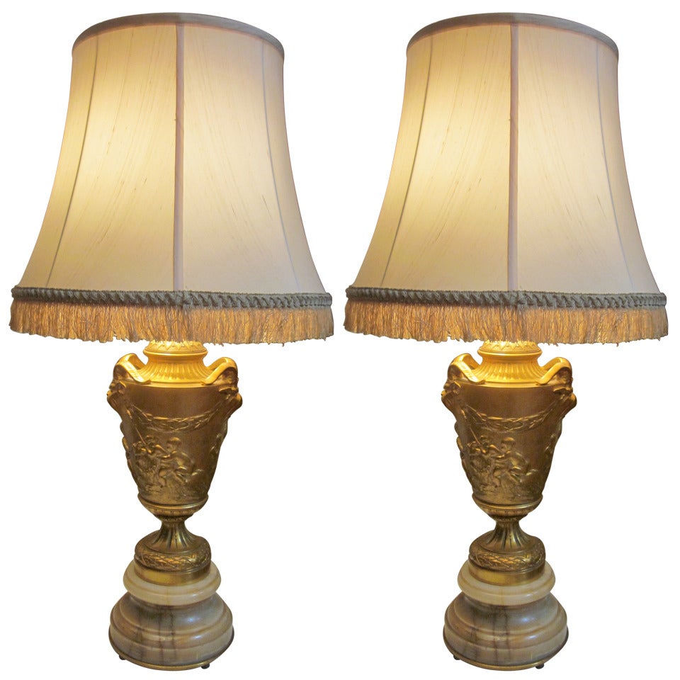 A Pair of 19th Century Bronze Lamps in the Manner of Clodion