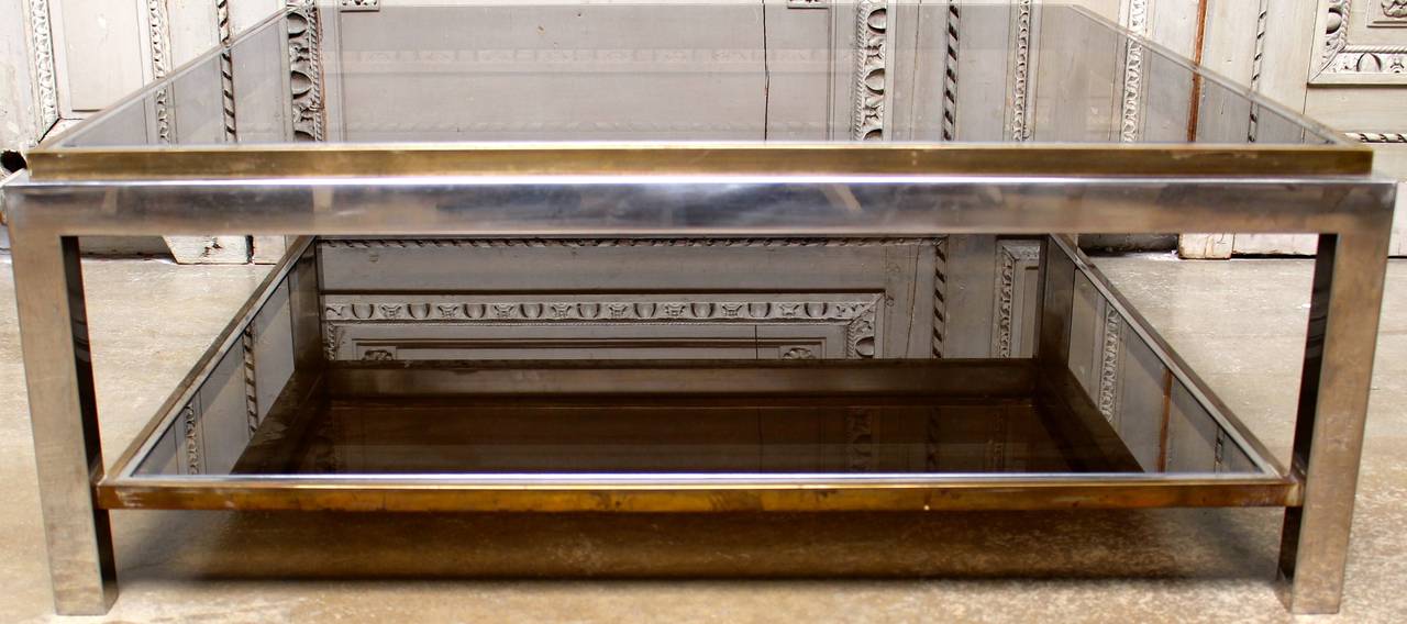 A French Brass and Chrome Cocktail Table with Smoke Glass in the Style of Maison Charles