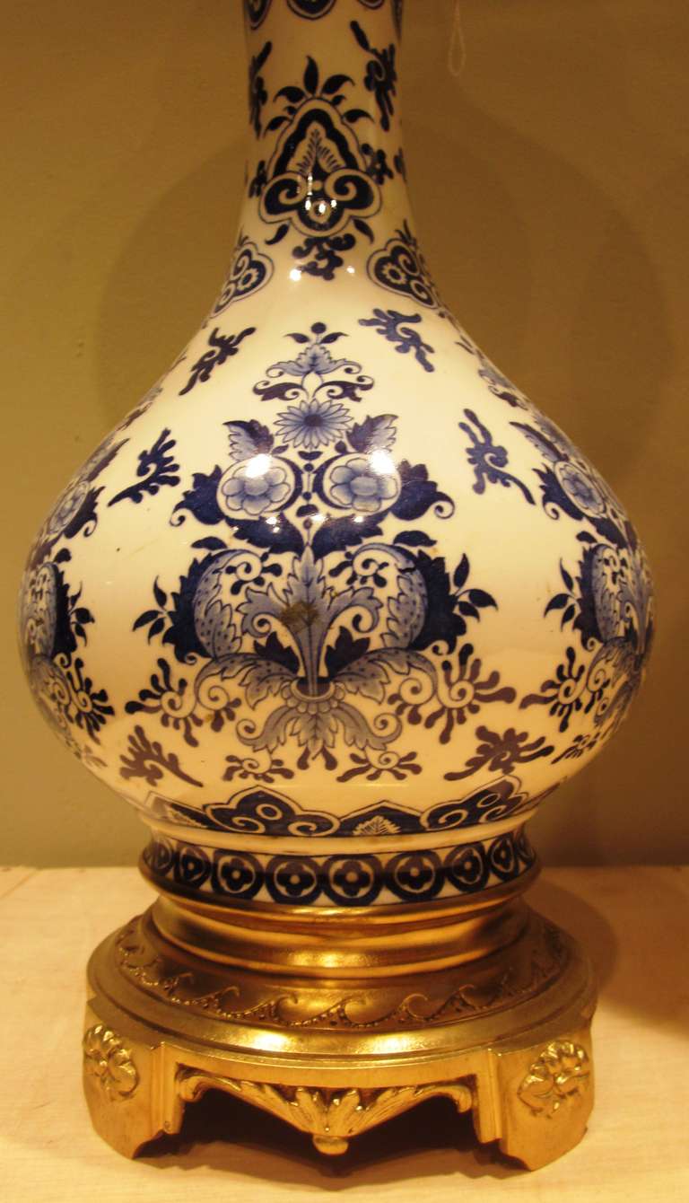 French Pair of Blue and White Faience Lamps with Bronze Mounts
