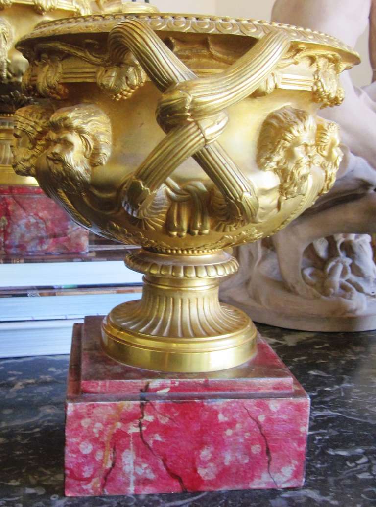 A Pair of Gilt Bronze Warwick Urns In Good Condition In Dallas, TX