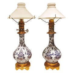 Pair of Blue and White Faience Lamps with Bronze Mounts
