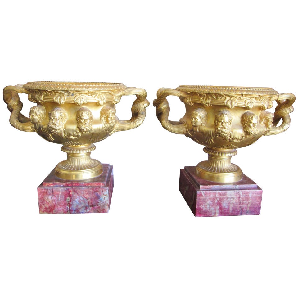 A Pair of Gilt Bronze Warwick Urns