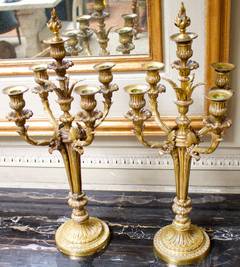 Pair of Louis XVI Style Bronze Candelabra with Flame Finial