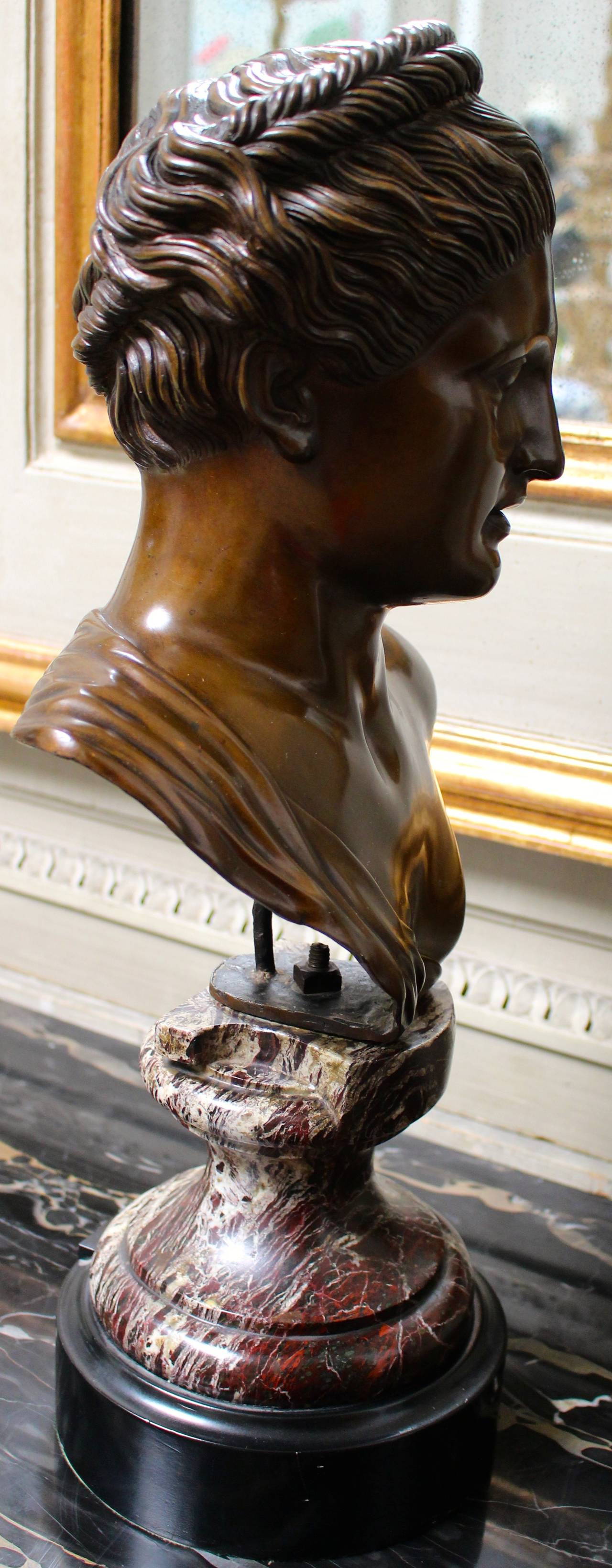 An Italian bronze bust of a woman in the classical manner by Fonderia Veraldi, Napoli.