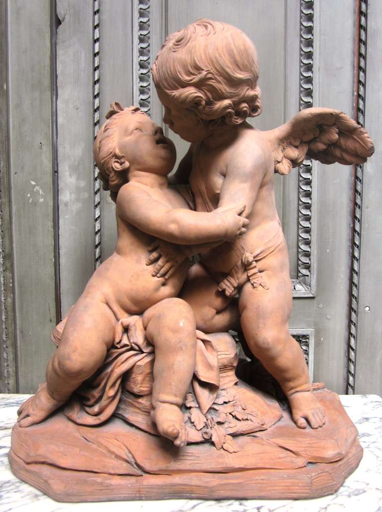 A French 19th Century Terracotta of Embracing Cherubs