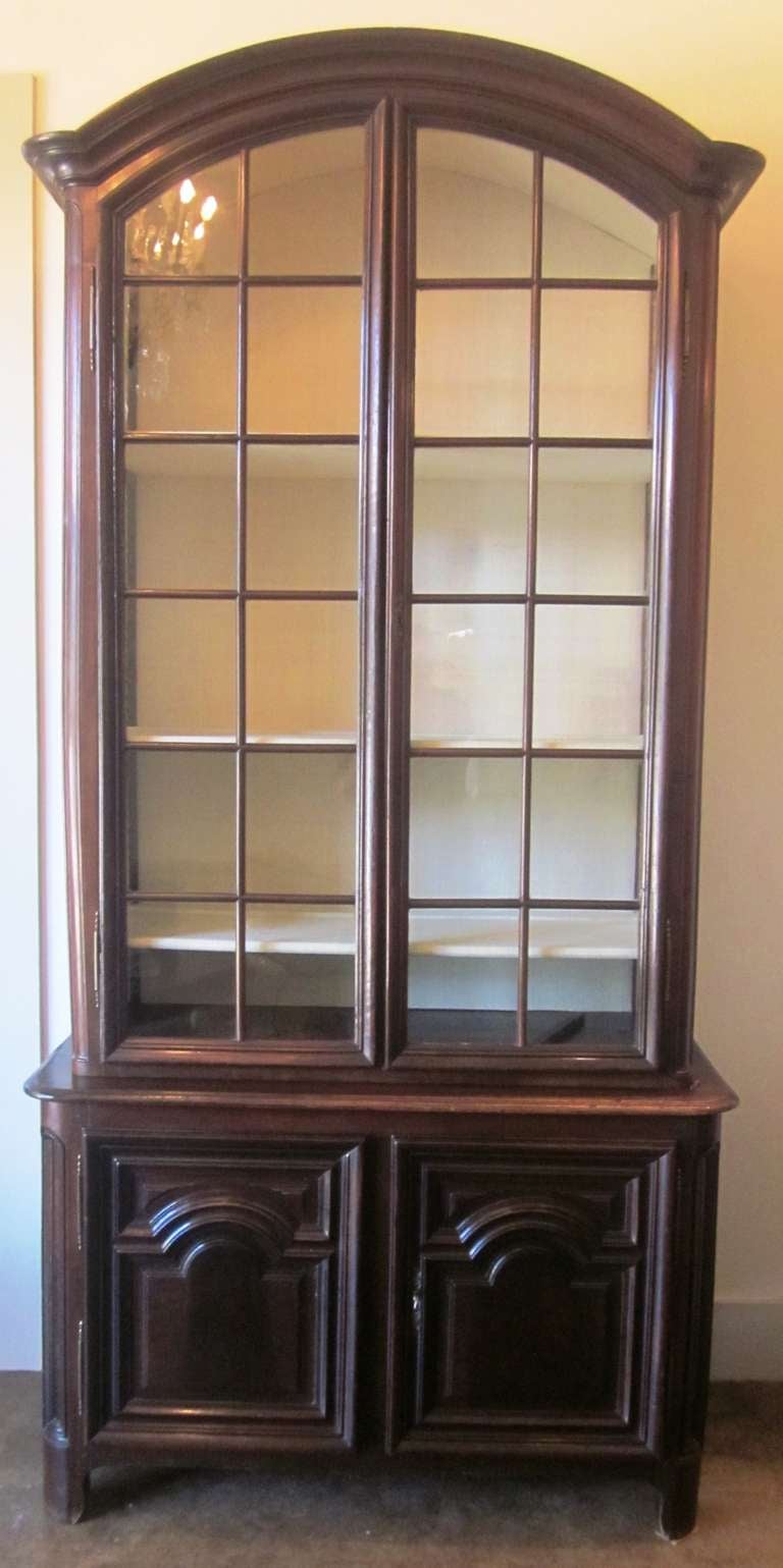 A 18th Century French Regence Style Walnut Buffet A Deaux Corps From the Isle de France Region 
The upper interior is upholstered in linen.  The back of the pieces has some replaced wood.