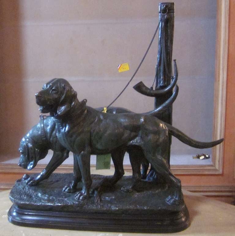 A French 19th Century Patinated Bronze Sculpture of a Pair of Hunting Dogs
Inscribed:  E. Delabrierre 
(Paul Edouard Delabrierre )