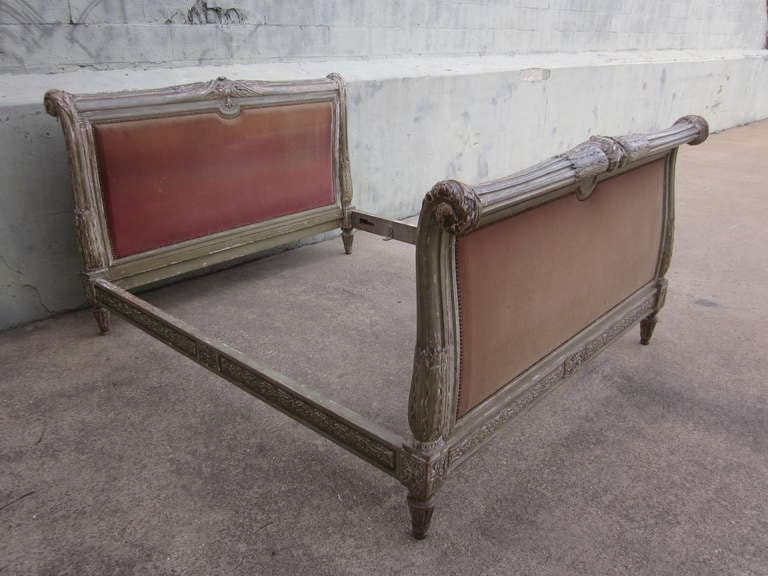 A French, 19th century Louis XVI style bed with a painted finish

Measures: Headboard: 69 ¼” W X 45” H.
Footboard: 69 ¼” W X 42.5” H.
89” length.
Interior: 65” W X 78” length.