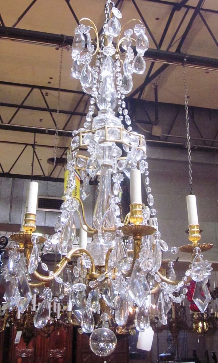 A French 19th century Louis XVI style, Marie Antoinette model bronze doré and crystal six-arm chandelier.