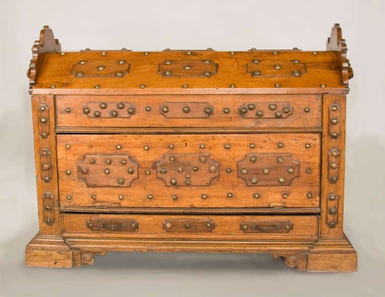 Later 16th Century, probl. Italian Coffer, or Vestment chest, with a 
domed lid, where the finest garmet's would have been stored. A 
drop front lided compartment above a single long drawer. All decorated
with handmade brass and iron nailheads.