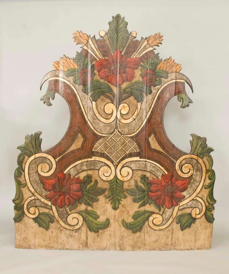 Exuberant Portuguese polycromed stately headboard.
This headboard probably came from one of the great houses in
Portugal.
Although very old, the painting as well as the gilding is still in
great shape and rather exhuberant.