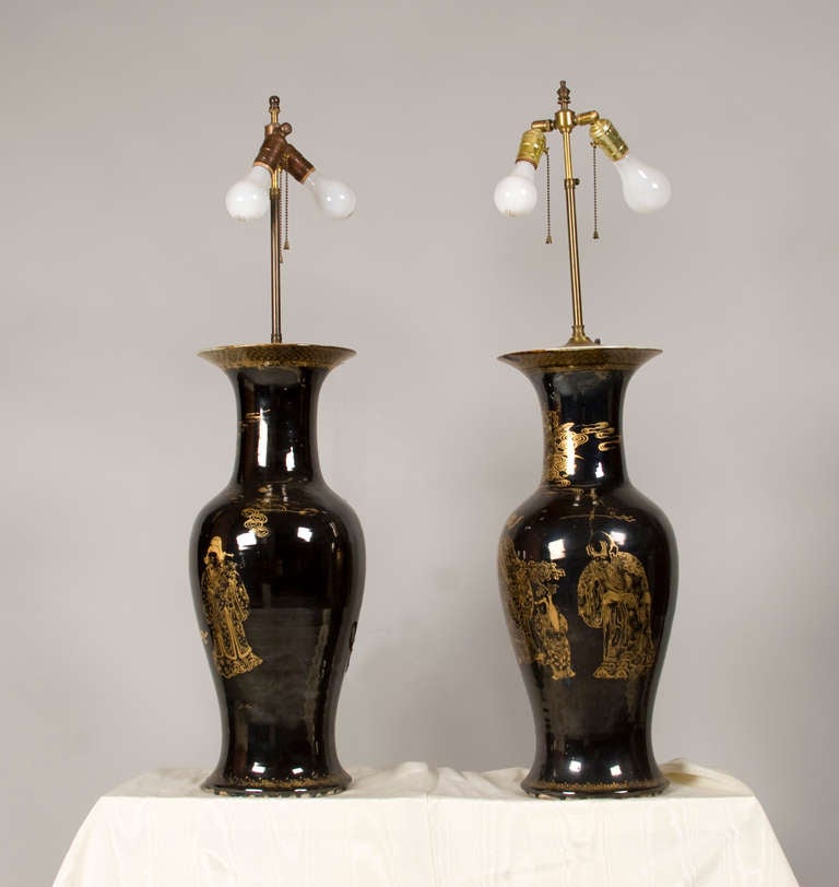 This very fine pair of Mirror Black baluster vases, with exquisite gilt painting, is
one of the finest pairs I have ever seen.  Shades in photo, not included.
Lamp shade fittings adjustable height: 36