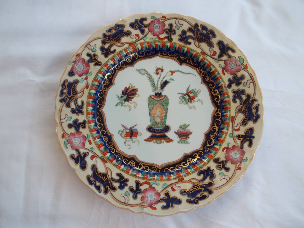 This is a good Pair of Ironstone Dinner Plates made by Mason's Ironstone, Lane Delph, England, Circa 1840.

The plates are beautifully and boldly decorated in the Chinese Antiquities pattern, sometimes known as the Vase and Symbol pattern. This