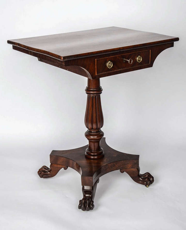 This is a high quality example of an English Late Georgian, Regency period side or work table from the early 19th century, circa 1825-1830 (George IV/William IV.)

The color of the wood is a fine golden brown showing excellent patination.

The