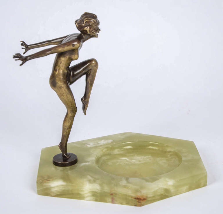 This is a superb and original BRONZE sculpture or figurine by the Austrian sculpter JOSEF LORENZL.

The figure is a typical example of his shapely nude dancing girl sculptures, for which he is renowned.  

The bronze sits on a very good onyx