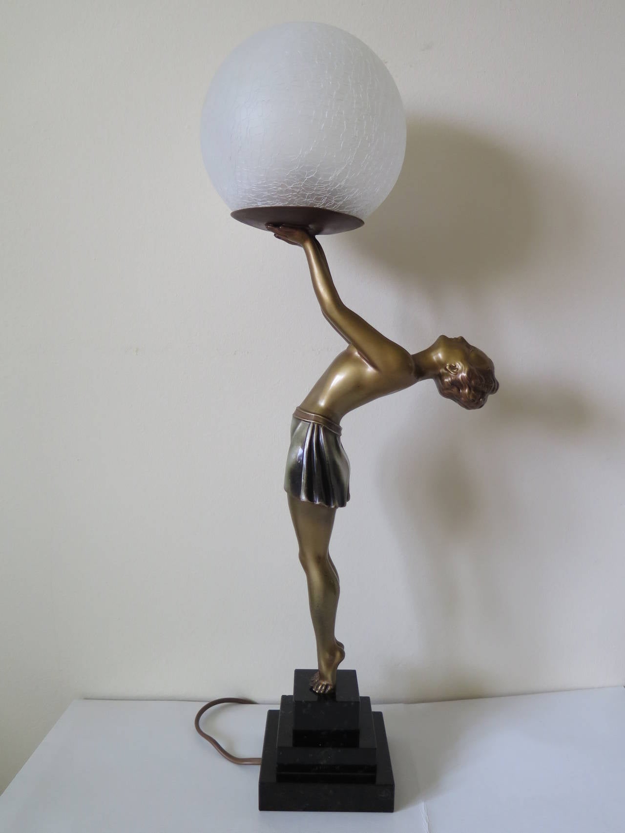 This is a stunning, tall, figurine table lamp of the Biba Lamp Girl after Max Le-Verrier ( 1891-1973), who was a famous French Sculptor, based in Paris.

The item is original to the Art Deco period and we date it to circa 1930.

The figurine is made