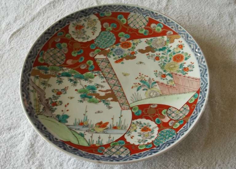 This is a fine example of a  Large JAPANESE, Porcelain, Charger or wall plaque. 

This charger has typical 