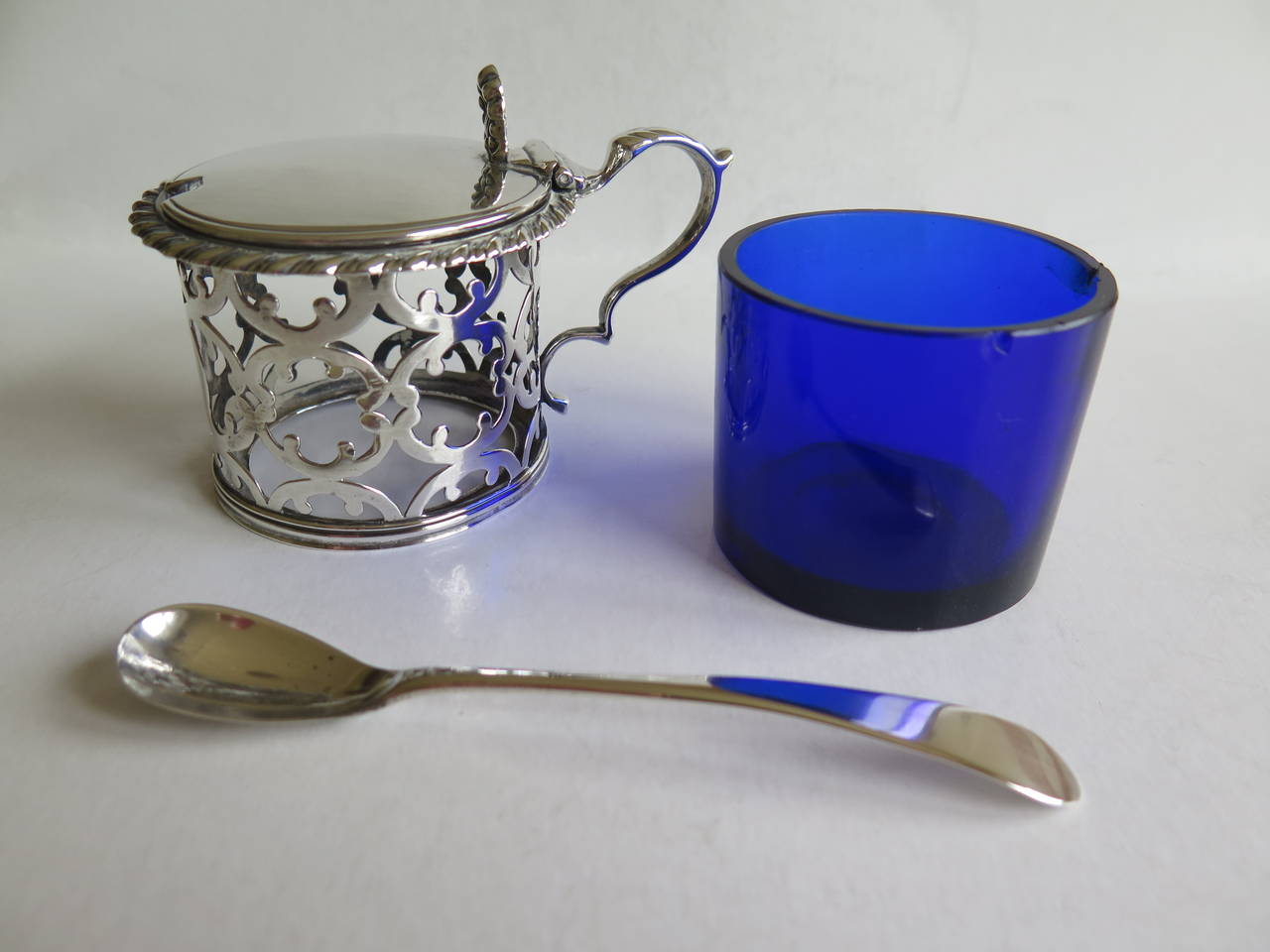 Victorian Sterling Silver Pierced Mustard Pot and Spoon, English 19th C. 1845 and 1800  For Sale